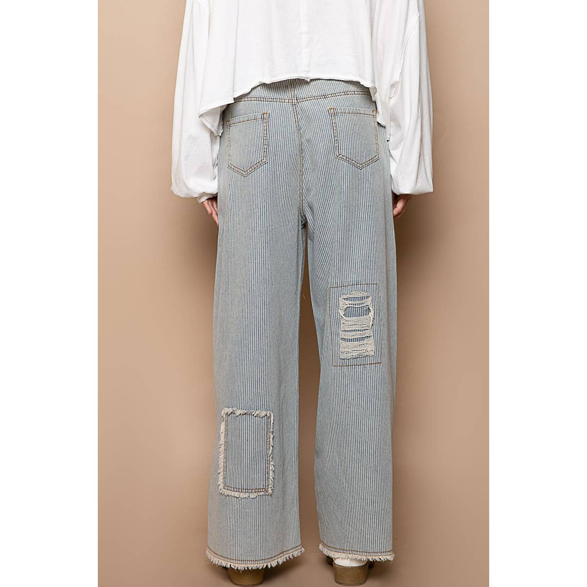 Bestseller “The Conrad” Distressed drawstring waist snap stripe denim wide leg pant