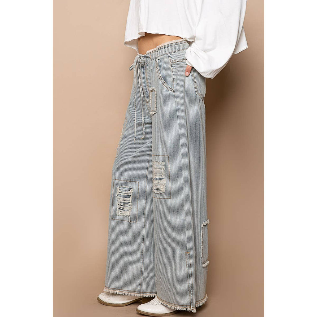 Bestseller “The Conrad” Distressed drawstring waist snap stripe denim wide leg pant